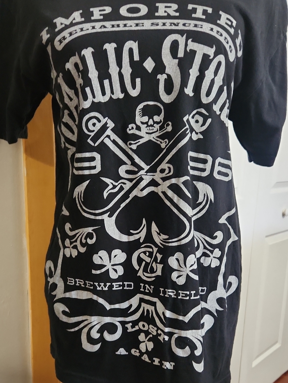Next Level Apparel Black Tee with White Celtic Skull & Crosshooks Graphic
